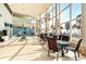 Enjoy a coffee in this light-filled, airy common area with seating and ocean views at 880 Mandalay Ave # C513, Clearwater Beach, FL 33767