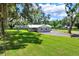 Charming home with a spacious front yard and mature trees offering shade at 9448 Mcintyre Rd, Brooksville, FL 34601