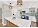 Updated kitchen featuring a large island, stainless appliances, and modern fixtures at 9448 Mcintyre Rd, Brooksville, FL 34601