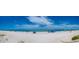 Expansive panoramic view of the sandy beach and oceanfront perfect for relaxation at 960 Gulf Blvd # 5, Indian Rocks Beach, FL 33785