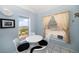 Bright dining area with natural light and beach view, perfect for enjoying meals at 960 Gulf Blvd # 5, Indian Rocks Beach, FL 33785