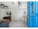 Inviting space with an island, TV, and comfortable seating that is steps away from the front door at 960 Gulf Blvd # 5, Indian Rocks Beach, FL 33785
