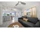 Comfortable living room adjacent to the kitchen and dining space offers seamless entertaining at 960 Gulf Blvd # 5, Indian Rocks Beach, FL 33785