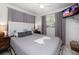 Comfortable main bedroom featuring ample natural light and a calming decor at 960 Gulf Blvd # 5, Indian Rocks Beach, FL 33785