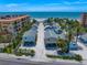 An aerial view of cozy neighborhood beach cottages, perfect for a peaceful coastal getaway at 960 Gulf Blvd # 5, Indian Rocks Beach, FL 33785
