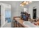Spacious bathroom featuring double sinks, warm cabinets, and a shower/tub combination at 10457 Cranston St, Spring Hill, FL 34608