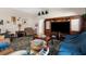 Inviting living room with vaulted ceilings and attractive entertainment center at 10457 Cranston St, Spring Hill, FL 34608
