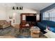 Comfortable living room with TV, vaulted ceilings, and wood-look flooring at 10457 Cranston St, Spring Hill, FL 34608