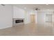 Spacious living room featuring neutral paint and a modern fireplace at 11448 Bay Gardens Loop, Riverview, FL 33569