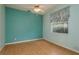 Bright bedroom with hardwood floors and window at 1156 Ridgegrove W Dr, Palm Harbor, FL 34683
