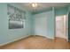 Bright bedroom with hardwood floors, window and closet at 1156 Ridgegrove W Dr, Palm Harbor, FL 34683