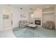 Comfortable living room with a fireplace, carpeted floors, and a ceiling fan at 1156 Ridgegrove W Dr, Palm Harbor, FL 34683