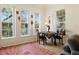 Cozy dining area with bright natural light, stylish decor, and comfortable seating at 1201 High Hammock Dr # 302, Tampa, FL 33619