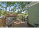 The home's deck offers a relaxing space to enjoy the outdoors at 1208 E Crenshaw St, Tampa, FL 33604