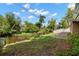Backyard with a lawn and access to the waterway at 1309 Eastfield Dr, Clearwater, FL 33764