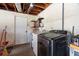 Laundry room area with washer, dryer, and utility sink at 1309 Eastfield Dr, Clearwater, FL 33764