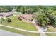 Well-maintained yard with mature trees and landscaping showcasing this lovely single-story home at 13167 Roseanna Dr, Spring Hill, FL 34609