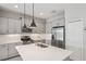 Modern kitchen with stainless steel appliances and central island at 13524 Circa Crossing Dr, Lithia, FL 33547