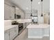 Modern kitchen with stainless steel appliances and ample counter space at 13524 Circa Crossing Dr, Lithia, FL 33547