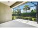 Enjoy this screened lanai with views of the manicured backyard and tropical palms at 13524 Circa Crossing Dr, Lithia, FL 33547