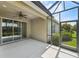 Covered, screened lanai offers a relaxing outdoor space with views of the lush landscaping at 13524 Circa Crossing Dr, Lithia, FL 33547