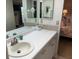 Bathroom featuring a vanity and sink with a view to the bedroom at 140 Nina Way, Oldsmar, FL 34677