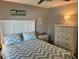 Bright bedroom featuring beach decor at 140 Nina Way, Oldsmar, FL 34677