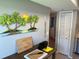 Kitchen featuring palm tree wall art and a wooden cutting board set at 140 Nina Way, Oldsmar, FL 34677