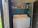 Functional laundry room features a modern washer and dryer at 140 Nina Way, Oldsmar, FL 34677