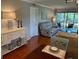 Comfortable living room featuring wood floors and view of outdoor space at 140 Nina Way, Oldsmar, FL 34677