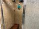 Enclosed shower with tile walls and shower seat at 140 Nina Way, Oldsmar, FL 34677