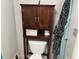Bathroom toilet with cabinet storage at 140 Nina Way, Oldsmar, FL 34677