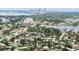 Bird's-eye view highlighting the property's location within a lush neighborhood near Tampa's cityscape at 1580 Arizona Ave Ne, St Petersburg, FL 33703