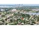 Bird's-eye view highlighting the property's location within a lush neighborhood near Tampa's cityscape at 1580 Arizona Ave Ne, St Petersburg, FL 33703