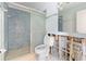 Bathroom with a shower, a toilet, and unfinished walls at 1580 Arizona Ave Ne, St Petersburg, FL 33703