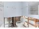 Bathroom with a toilet, a mirror, and unfinished walls at 1580 Arizona Ave Ne, St Petersburg, FL 33703