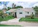 Charming home with a driveway and landscaping at 1580 Arizona Ave Ne, St Petersburg, FL 33703
