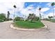 This corner lot features a home on a lawn on a sidewalk-lined neighborhood street at 1580 Arizona Ave Ne, St Petersburg, FL 33703