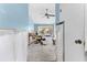Unfinished living room with blue walls, slider door to outside, and concrete floor at 1580 Arizona Ave Ne, St Petersburg, FL 33703