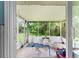 Sunroom with sinks, tile, and a view of the outdoors at 1580 Arizona Ave Ne, St Petersburg, FL 33703