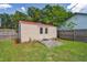 Exterior view of backyard storage shed at 17701 Sunrise Dr, Lutz, FL 33549
