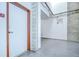 Hallway showing door, brick wall and concrete floors at 2001 E 2Nd Ave # 12, Tampa, FL 33605