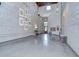 Open floor plan featuring tall ceilings, exposed brick, and lots of natural light at 2001 E 2Nd Ave # 12, Tampa, FL 33605