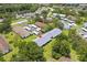 Aerial view of condo complex showcasing the lush landscaping, parking, and serene community at 2557 Laurelwood Dr # 10D, Clearwater, FL 33763