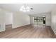 This living room has wood flooring and sliding glass doors to let in the natural light at 2557 Laurelwood Dr # 10D, Clearwater, FL 33763