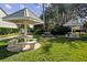 Relax and unwind in the picnic area with covered tables and well-manicured lawn at 2557 Laurelwood Dr # 10D, Clearwater, FL 33763