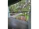 Balcony overlooking trees and street at 2850 Somerset Park Dr # 203, Tampa, FL 33613