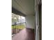A relaxing balcony view of green yard, providing a tranquil outdoor space and fresh air at 2850 Somerset Park Dr # 203, Tampa, FL 33613