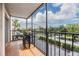 Enjoy the weather on this airy screened balcony with bar-top table and seating for two at 2901 W 26Th St # 301, Bradenton, FL 34205