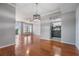 Open living space featuring wood-look floors, recessed lighting, ceiling fan and an open kitchen view at 2901 W 26Th St # 301, Bradenton, FL 34205